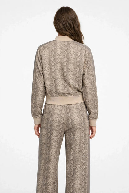 PUMA Felpa con zip PYTHON PRINT TRACK JACKET marrone e rosa da donna con fantasia pitonata