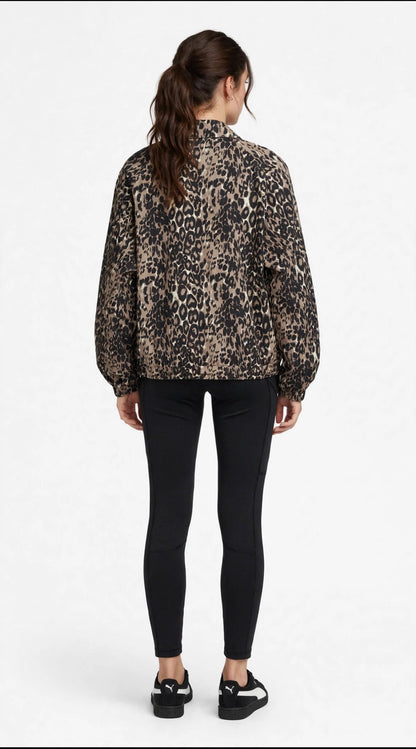 PUMA felpa RUN WOVEN beige da donna con stampa grafica all-over e chiusura zippata.